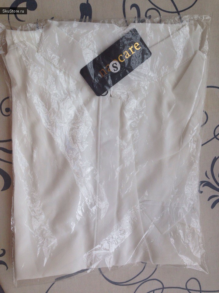 Белая блузка в упаковке